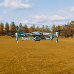 closeup-drone-flying-green-field-forest.jpg