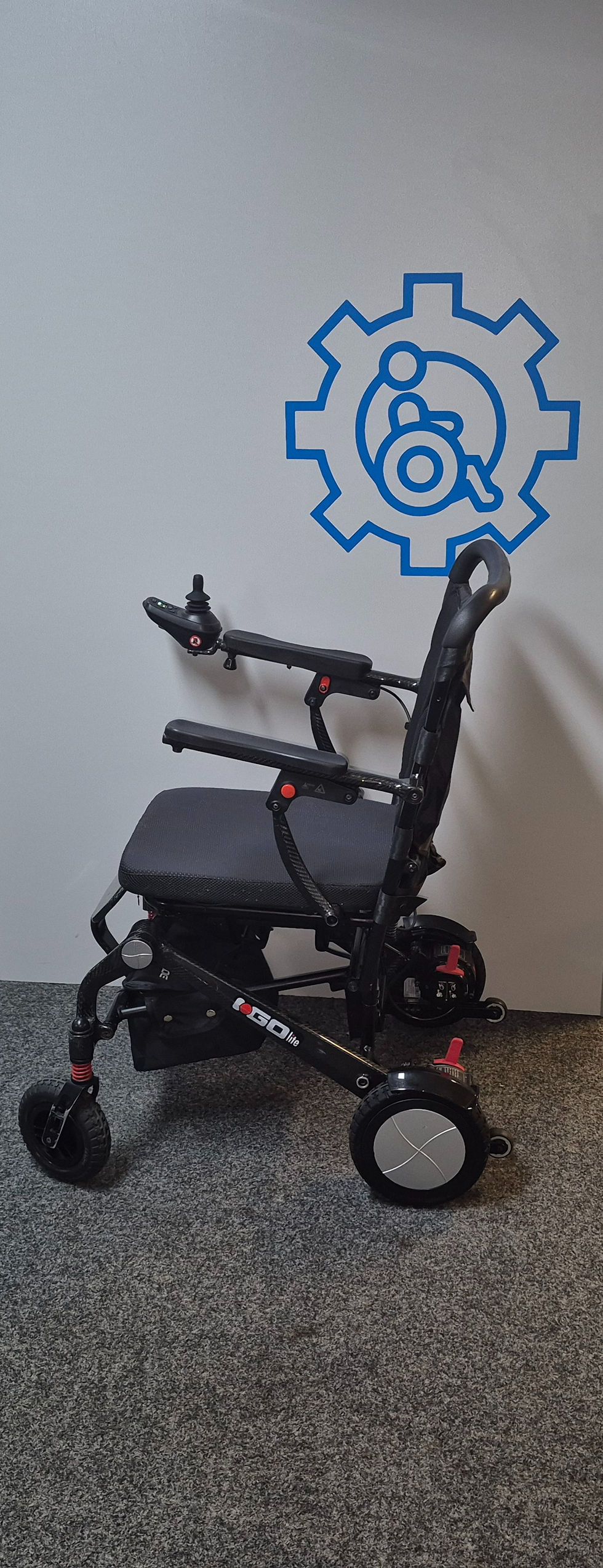 Thumbnail: Preowned Pride i Go Lite Carbon Fibre Folding Powerchair - Side Left