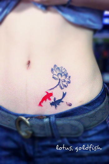 free-tattoo-design-lotus-flower-goldfish.jpg