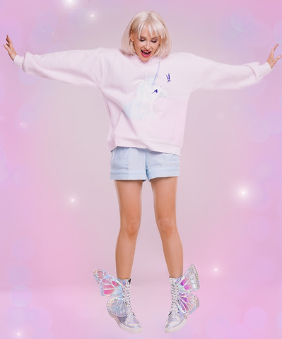 Elle Enchanted jumping excited in fairy boots