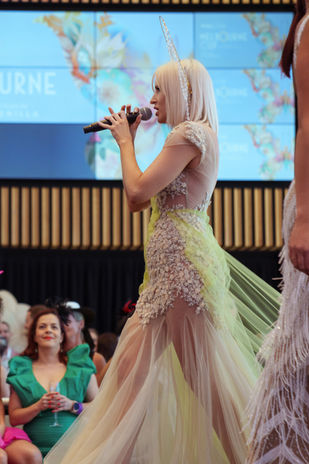 Elle Enchanted performers on the fashion runway for Melbourne Cup