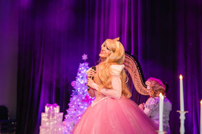 Elle Enchanted performs as Sleeping Beauty at a Christmas concert