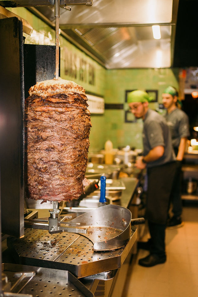 Juicy beef döner kebab roasting on a spit in Kebap with Attitude’s kitchen during the XBOX collaboration event.