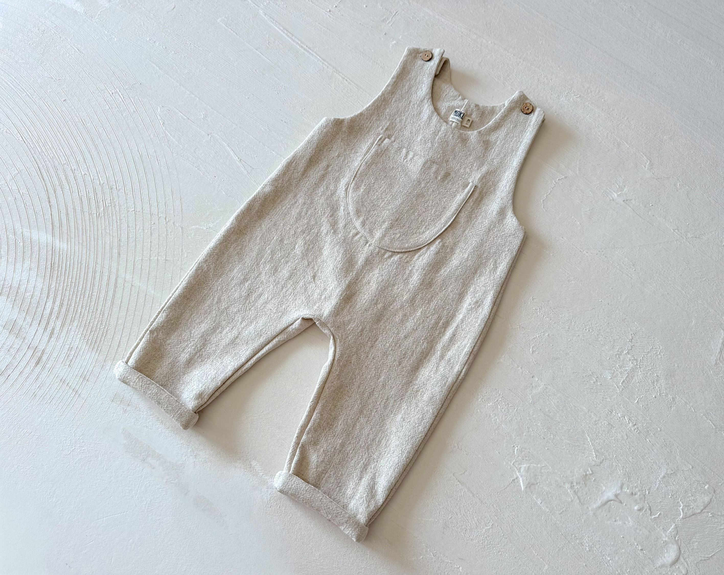 Macacão comprido com bolso central