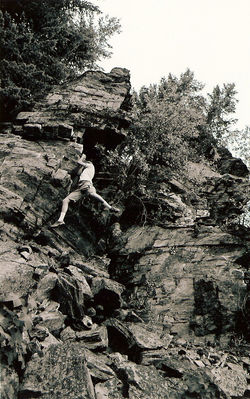 Jake hanging from Mountain.jpg