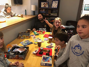 Kidzz playing board games at The Coffee Oasis wiht homeless youth