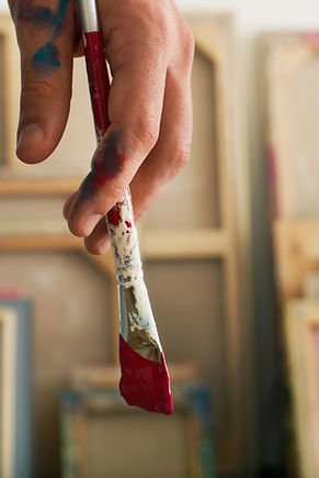 Holding a Paintbrush_edited.jpg