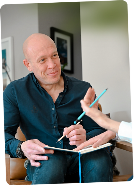 Life coaching client smiling
