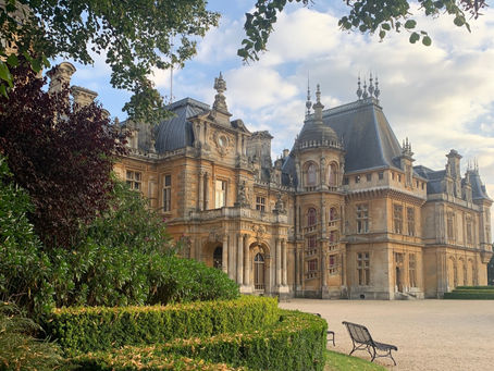 An ornate bath stone chateau country house, Waddesdon Manor, in Buckinghamshire
