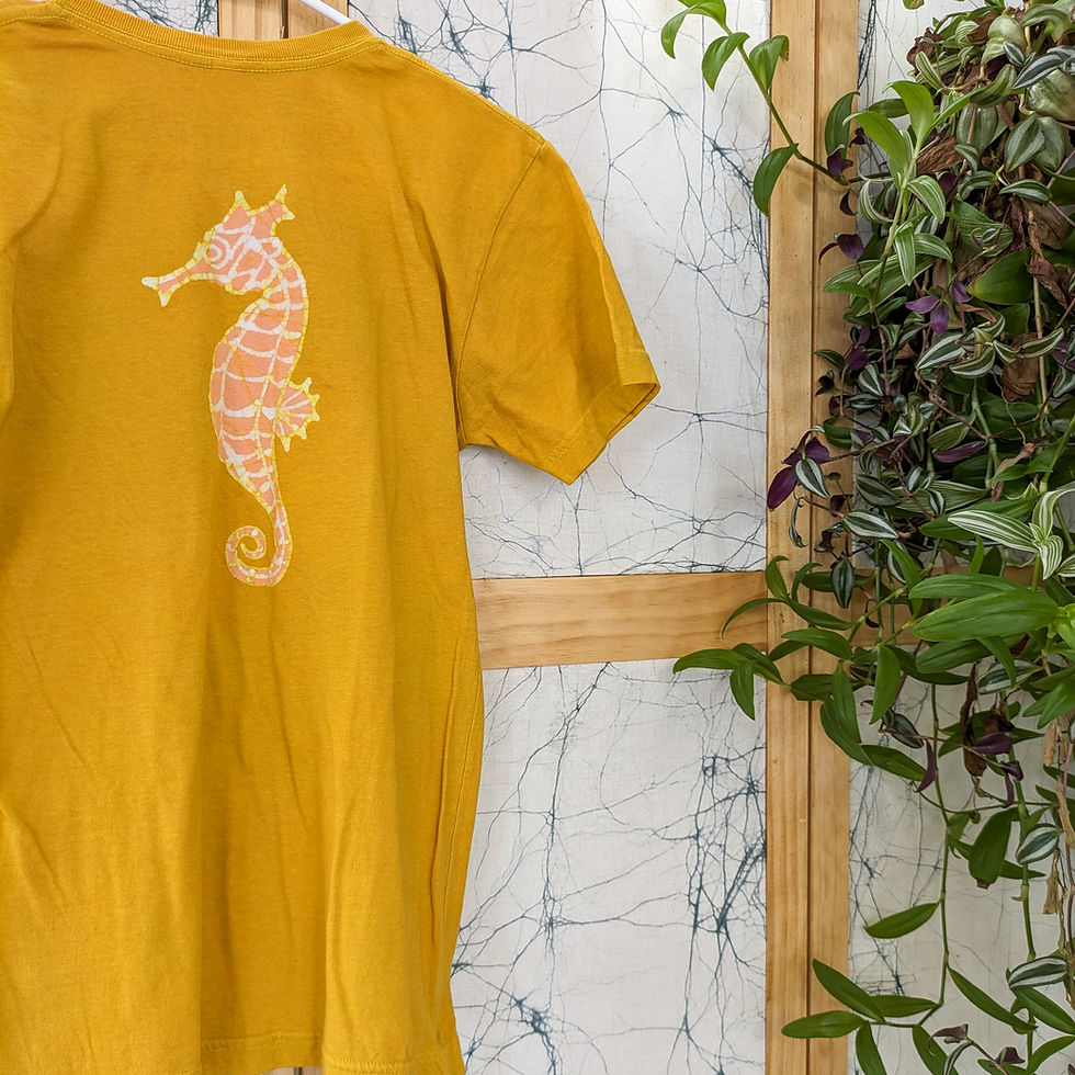 Thumbnail: Seahorse in that mustard yellow that EVERYONE wore, like, two summers ago.