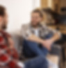 smiley-brothers-sitting-couch-side-view.jpg