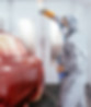 Paint Technician - Painting Red Car in Paint Booth.jpeg