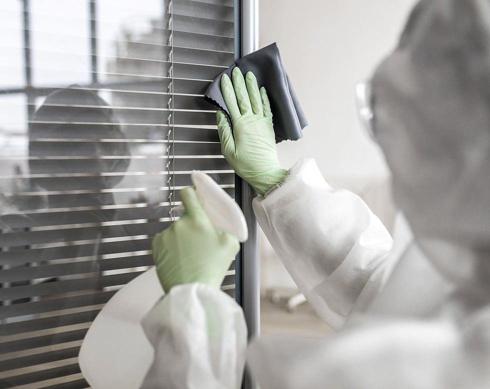 person-disinfecting-dangerous-area-while-wearing-protective-suit-min.jpg