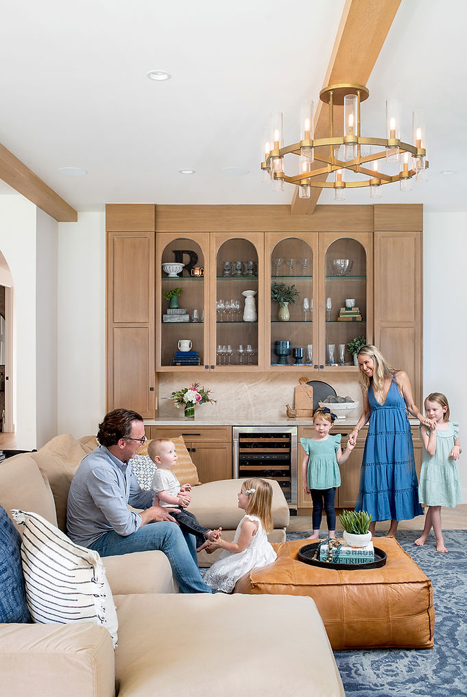 Family gathered in living room in a house in Manhattan Beach