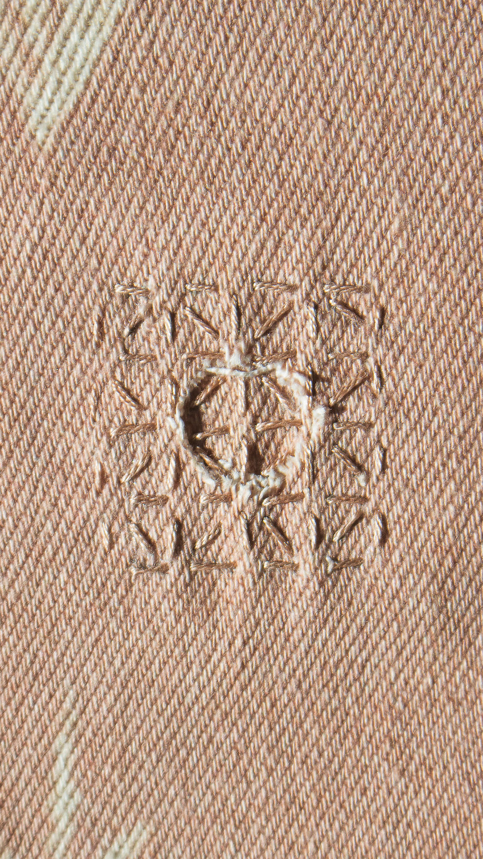 art of mending on botanic print denim - designed by Lam Wing Sum hong kong sustainable fashion designer