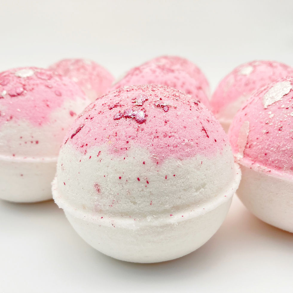 Thumbnail: Love Spell pink and white bath bombs