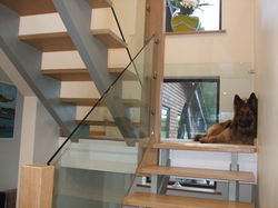 Custom Oak staircase with glass rail