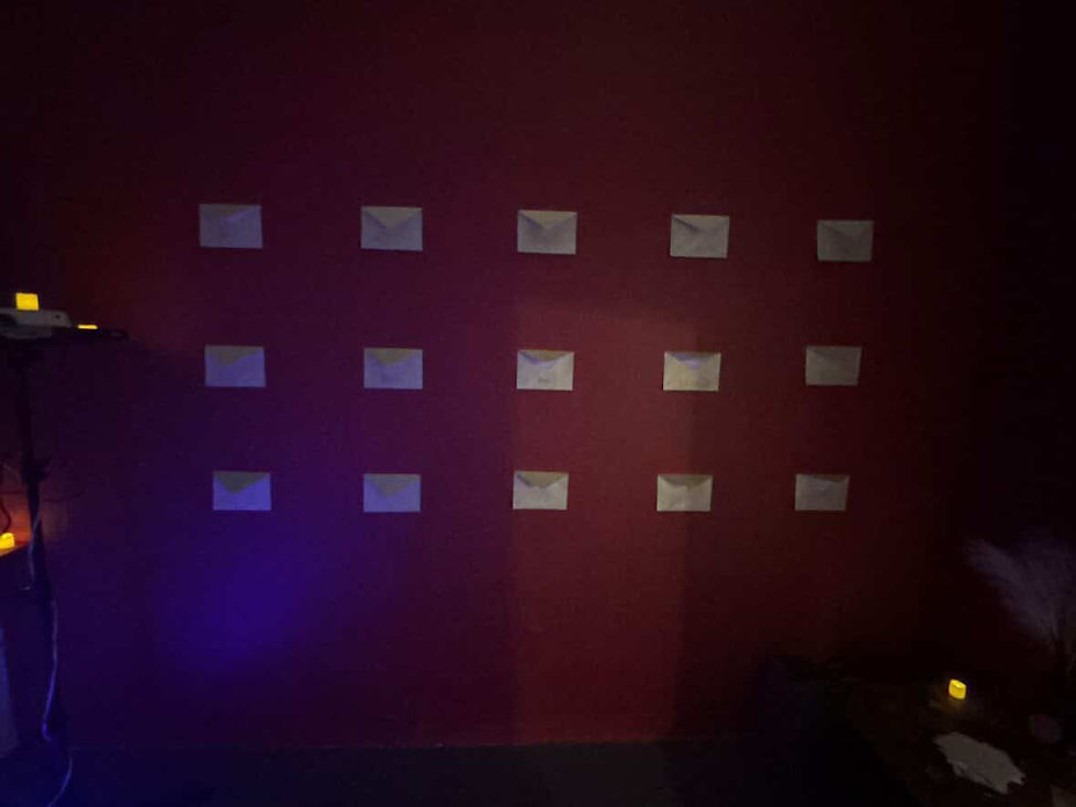Envelopes arranged in a grid on the wall of The Clifford for “Safe Space” (Photo by Dariana Lalin)