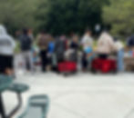 Students gathering groceries from the food pantry table (Photo by Raina Roller)