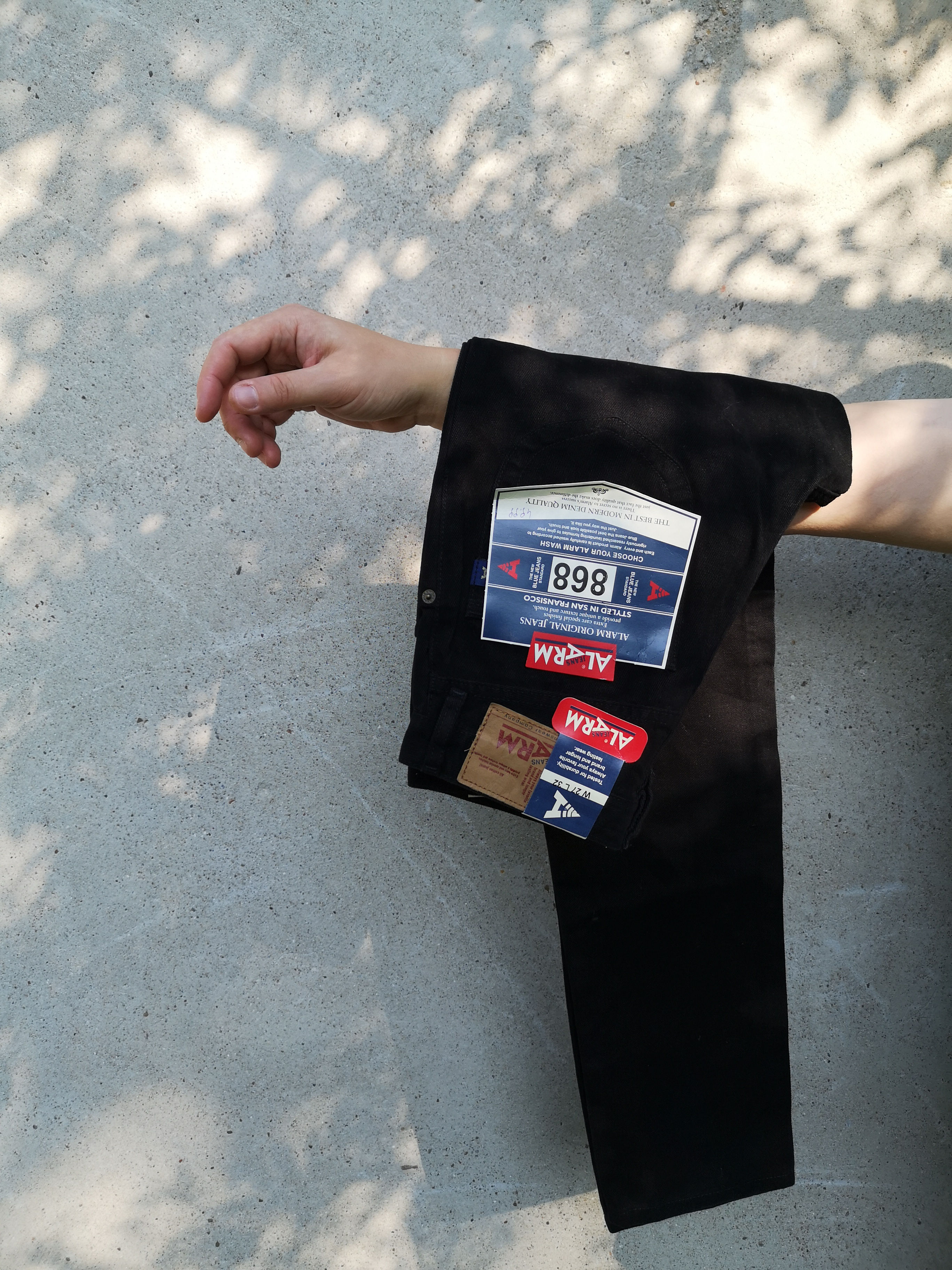 Alarm czarne jeansy vintage 27/32