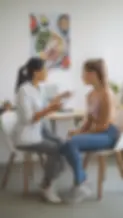 A healthcare professional consulting with a female patient in a clinical setting—personalized weight loss guidance at Trim MD