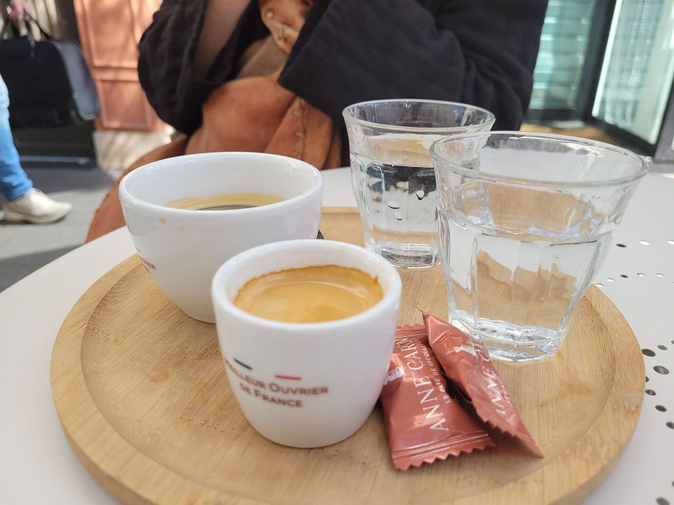 Two espressos served on a wooden board at Anne Caron café, Paris — a Meilleur Ouvrier de France coffee roaster on rue Notre-Dame de Nazareth