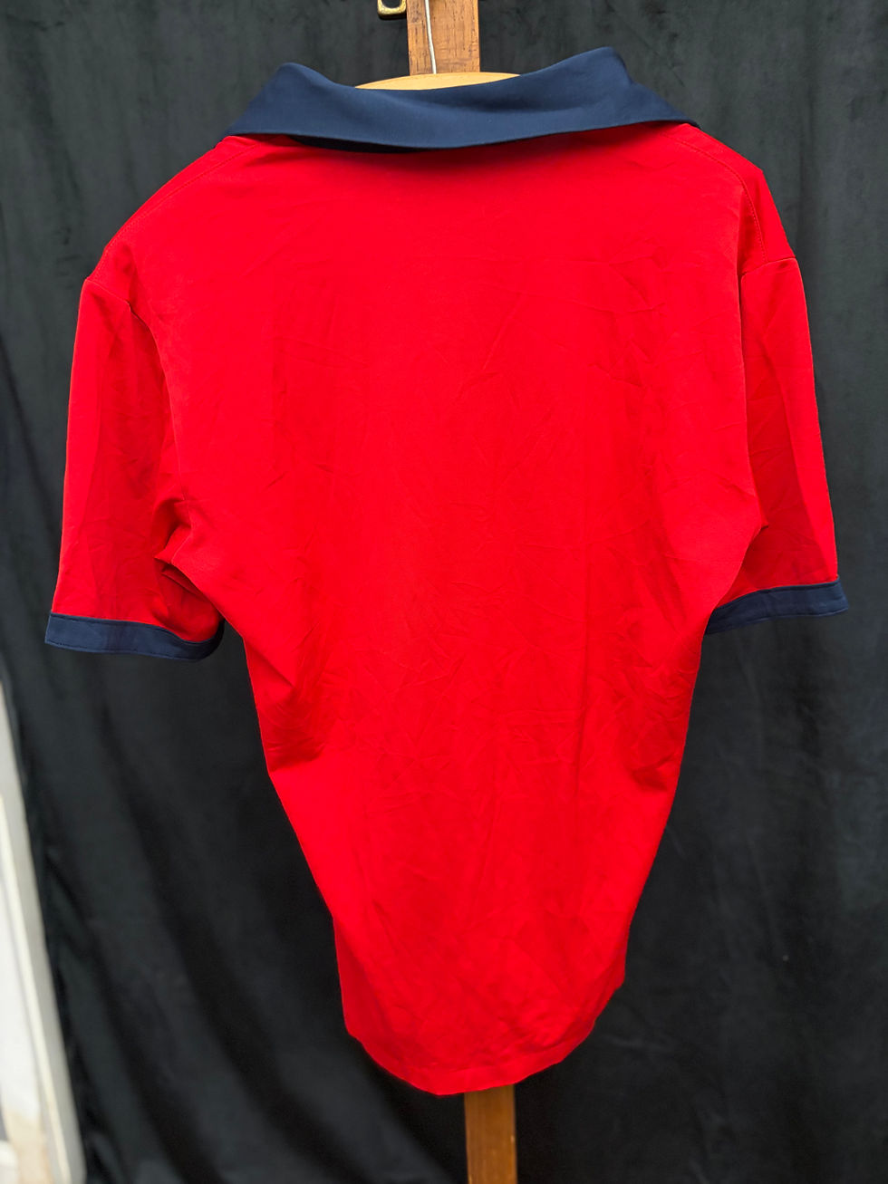 Thumbnail: Back of red 1970s Countess Mara polo with navy trim.