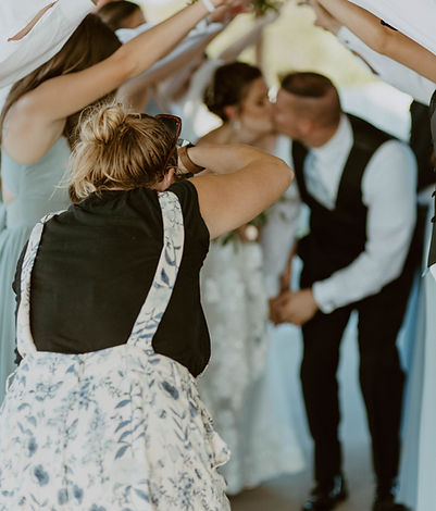 Christa & Andrew Working together at a wedding in denton, nebraska by Christa Schiessl Pho