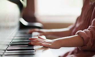 Girl Practicing Piano