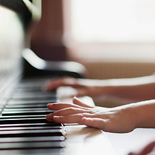 Girl Practicing Piano