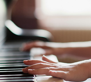 Girl Practicing Piano