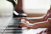 Girl Practicing Piano