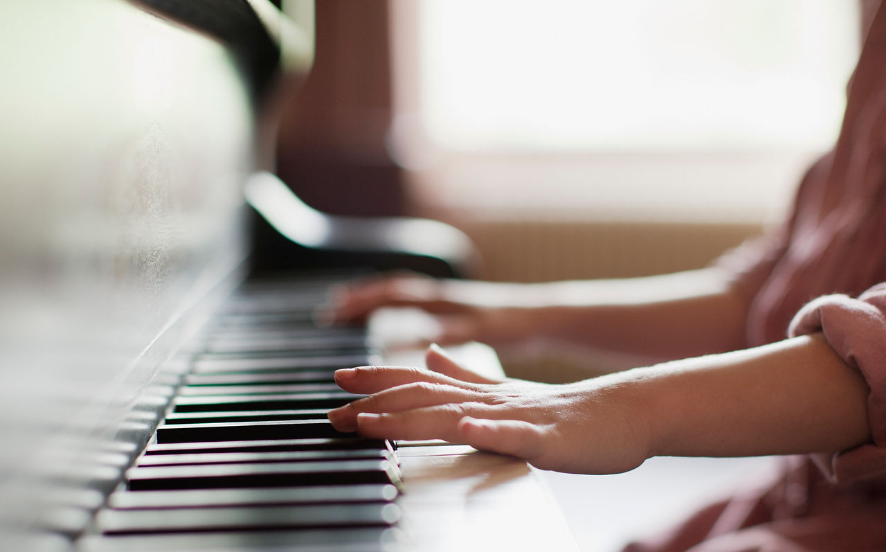 Girl Practicing Piano