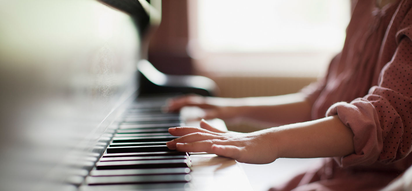 Girl Practicing Piano