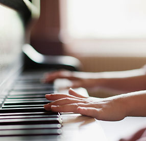 Girl Practicing Piano