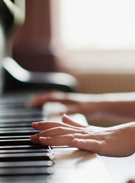 Girl Practicing Piano