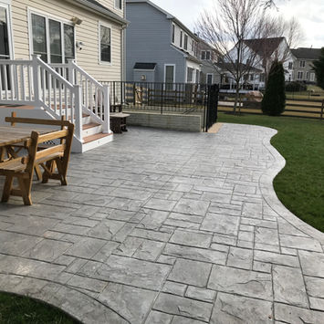 Stamped Concrete Patio by Greystone Masonry 