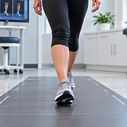 Podiatrist examining a patient’s foot at Boca Raton Foot & Ankle Specialists