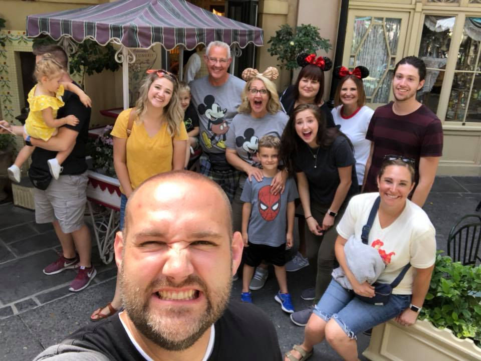 A pause for a family photo in the French Quarter of Disneyland