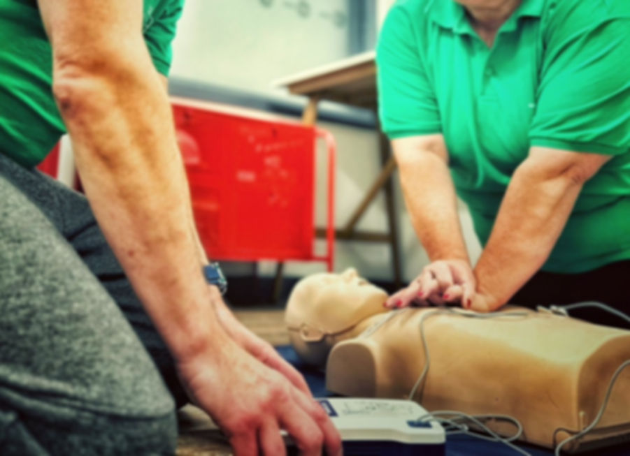 Kate and Donald demonstrating CPR 2.jpg
