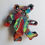 Thumbnail: rainbow colored bear magnet