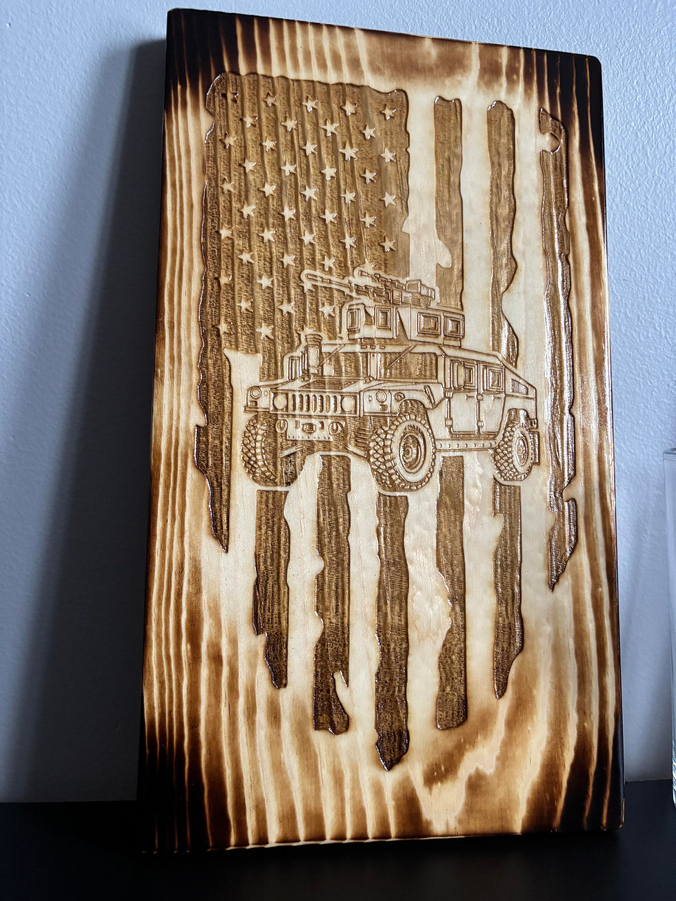 Thumbnail: American Flag with a Military Humvee Sign