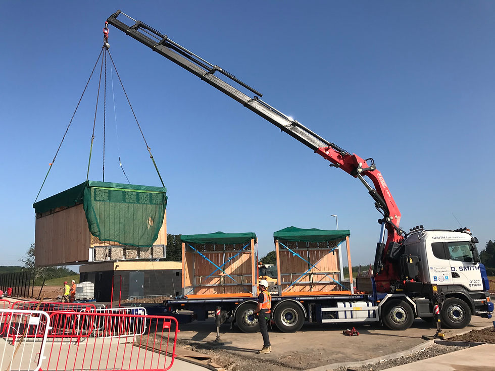 Cycle parking being delivered from the back of a lorry. Already planted and ready to use.