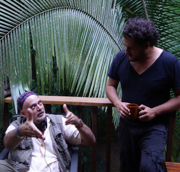 Christopher Coppola planning a scene with cinematographer Sebastian Heriart in the jungles of Belize.