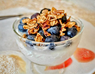Fresh yogurt with blueberries and house-made granola served at The East Wind Guesthouse