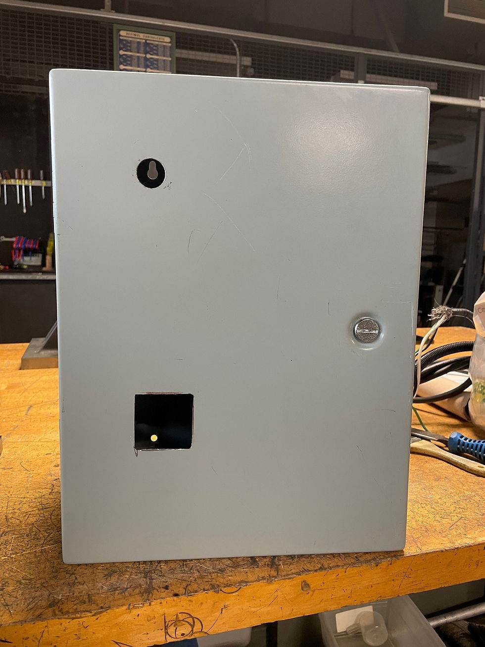 Figure 36: Indoor enclosure hole for light and square cut for temperature control