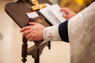 Priest's Hands on Book