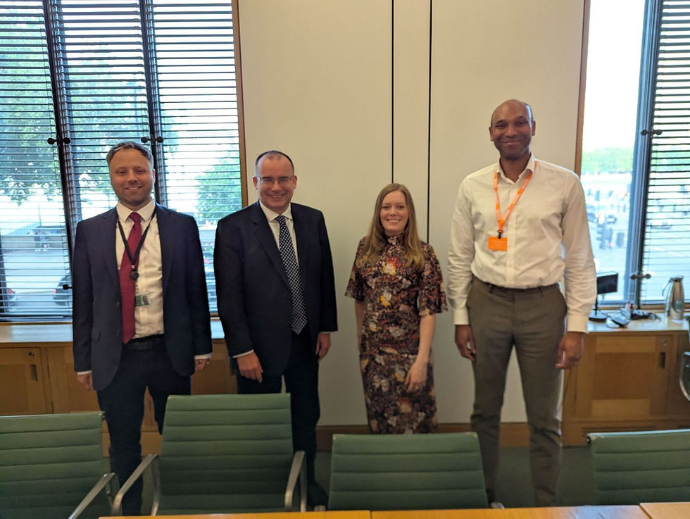 Meeting Minister Gareth Thomas, alongside the report's authors: Hugh Goulbourne and Joe Jervis.