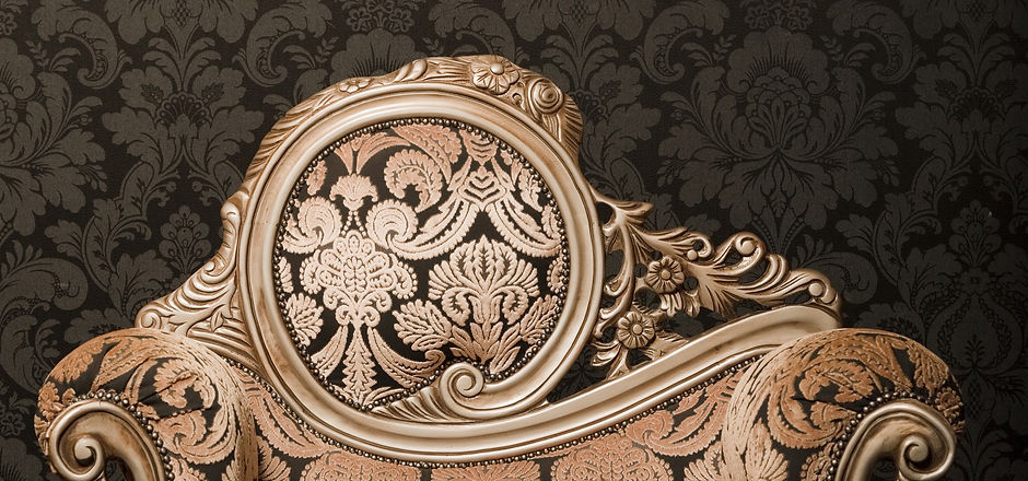 vintage brown-gray chair with gold accen