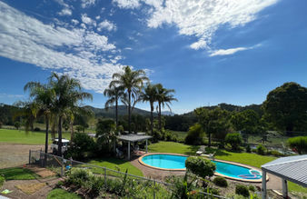 Swimming pool on a sunny day at Altamira Along Bakers Creek farm stay in Gloucester, Barrington Tops, Mid North Coast, NSW
